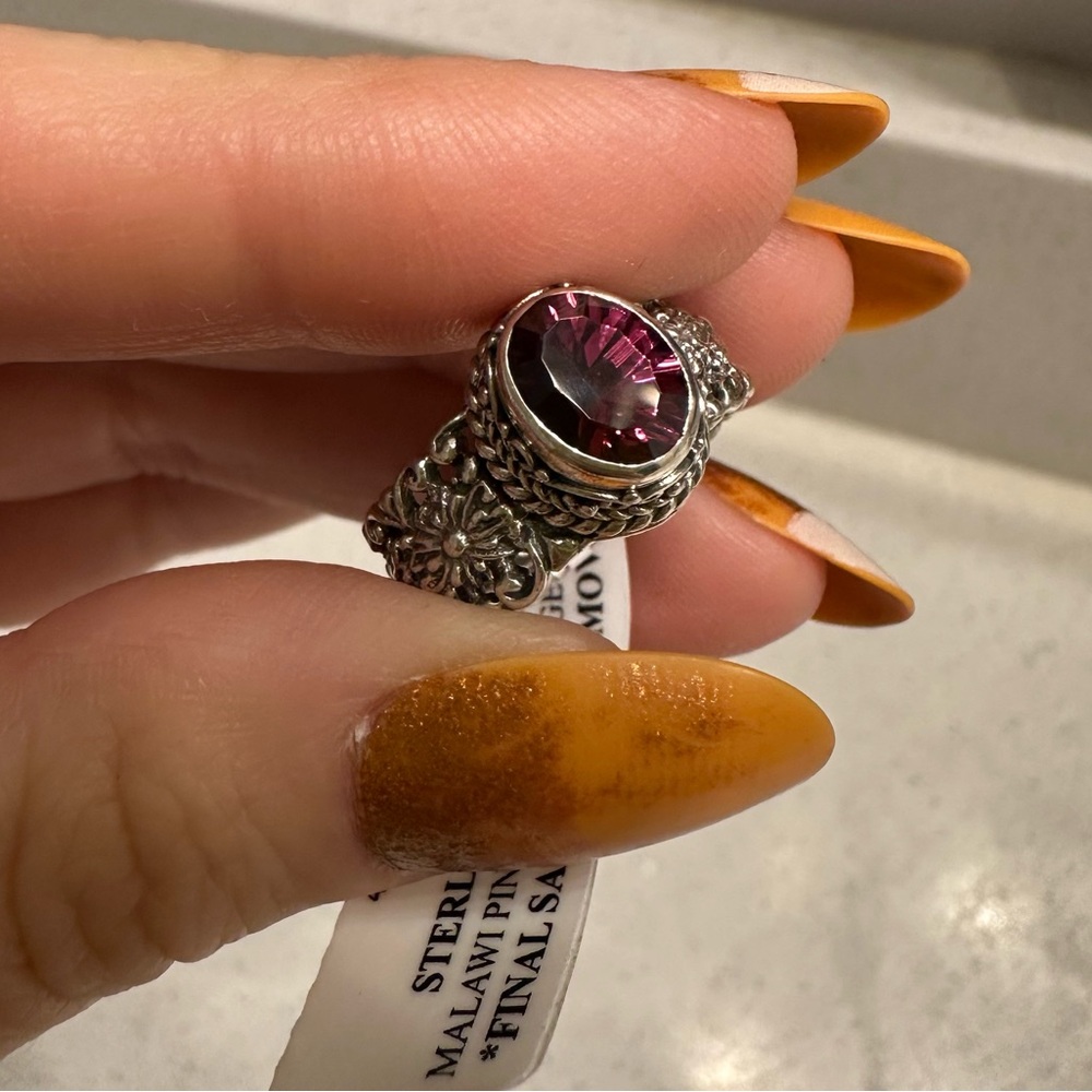 Elegant Silver Ring with color changing garnet Gemstone in a size 6